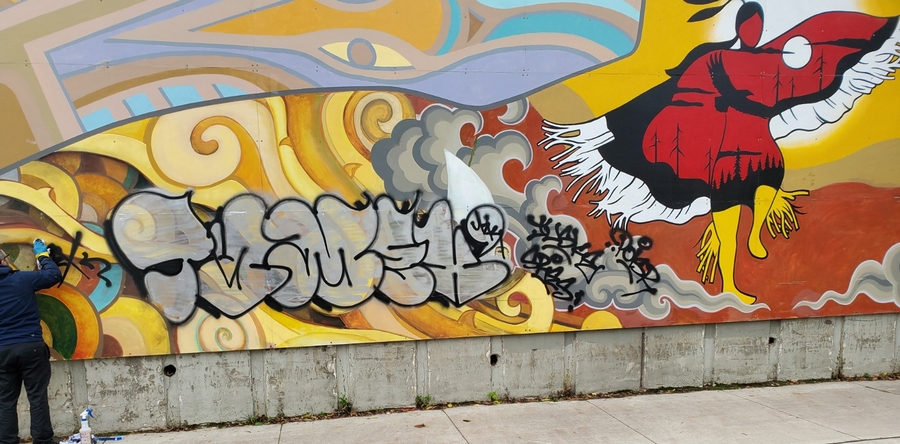 Mural before as we start to clean
